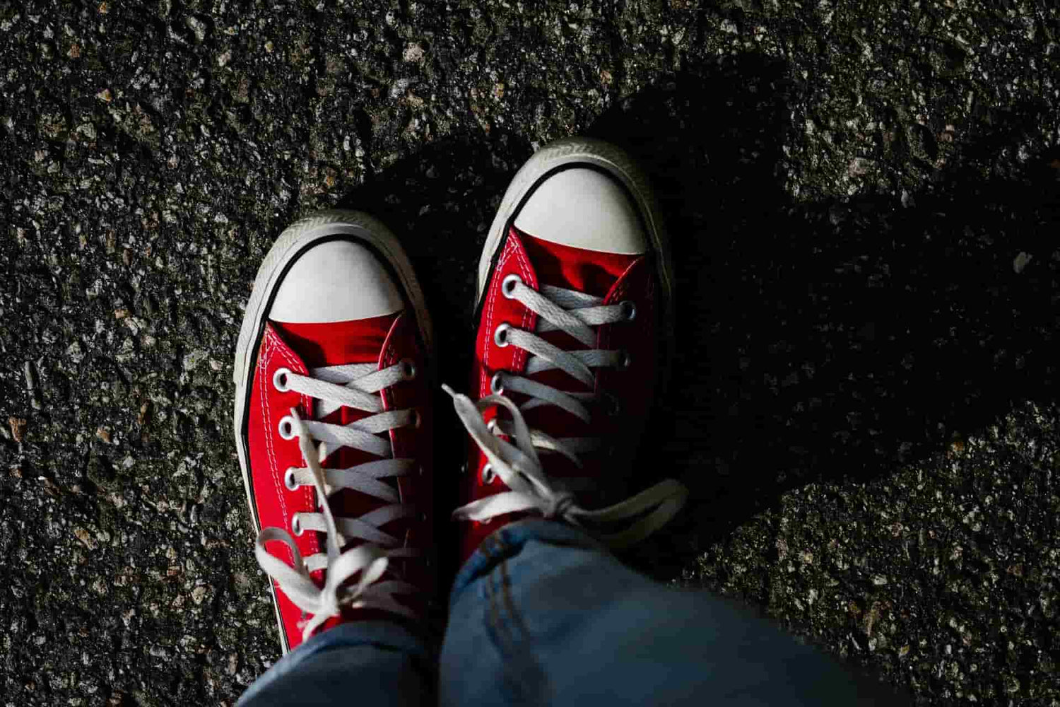 Guy wearing red shoes